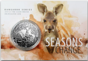 Two Eastern Grey Kangaroo's, one with a joey of her own. Lettering: ONE DOLLAR 1 oz .999 Ag